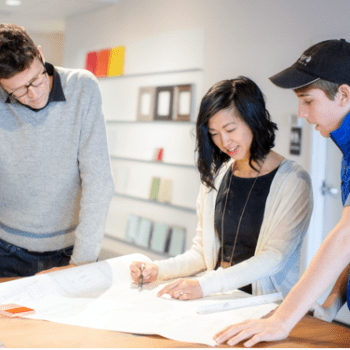 Drexler employees going over blueprints.