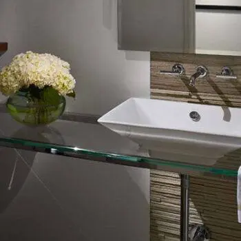 Glass countertop for a bathroom vanity area for a residential home.